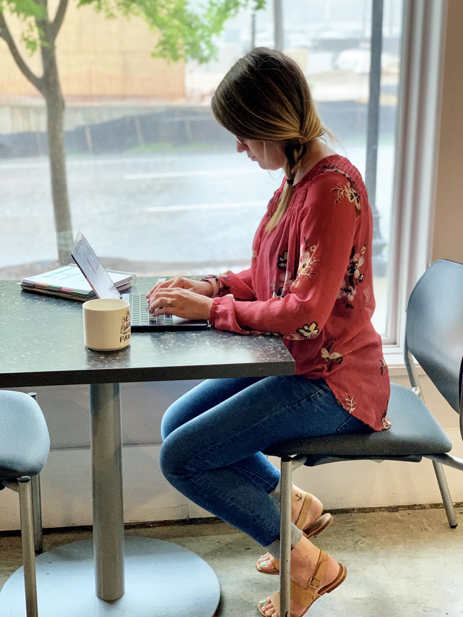 Member focused on work at a coworking desk