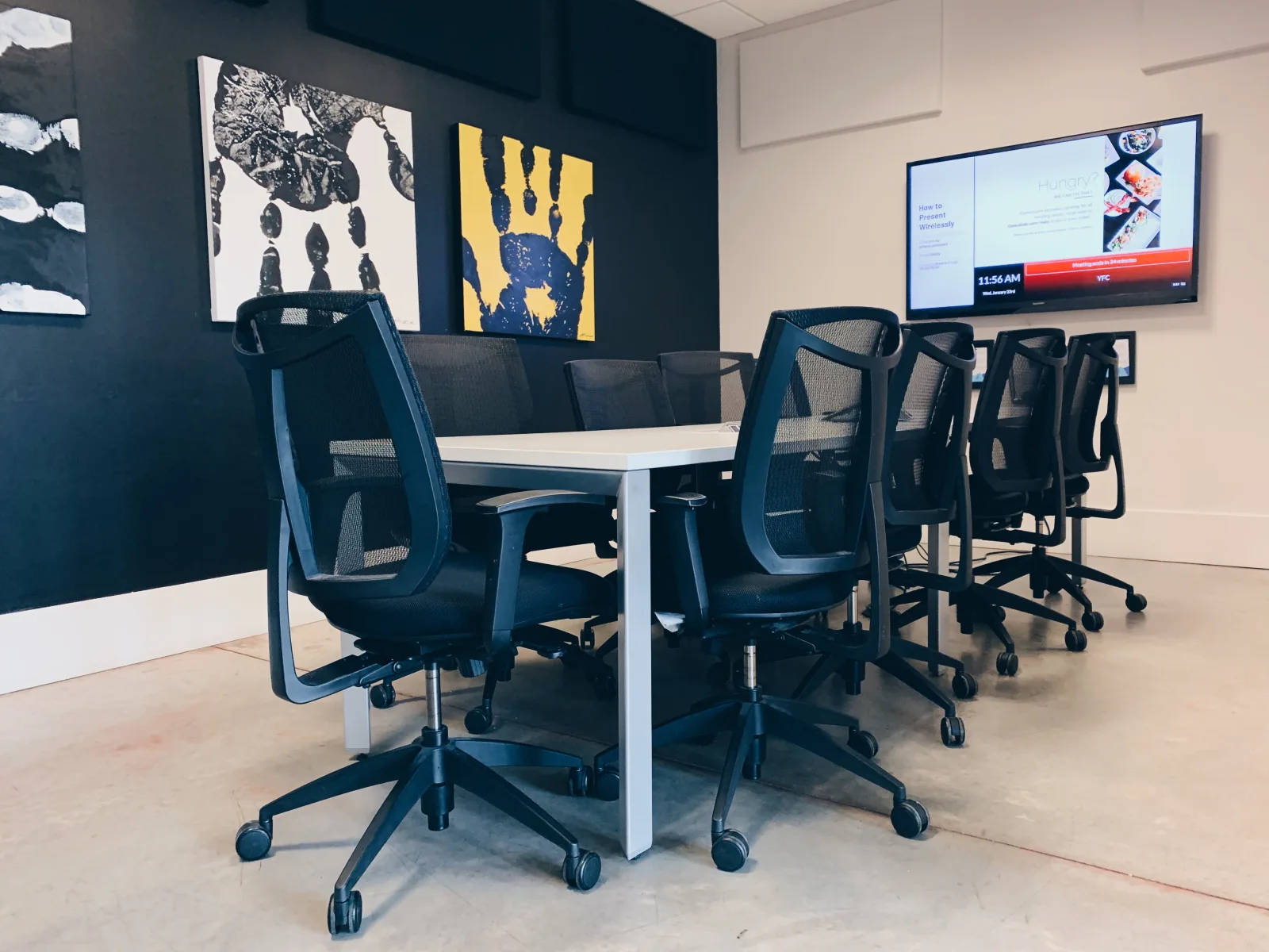 Meeting room with dark accent wall