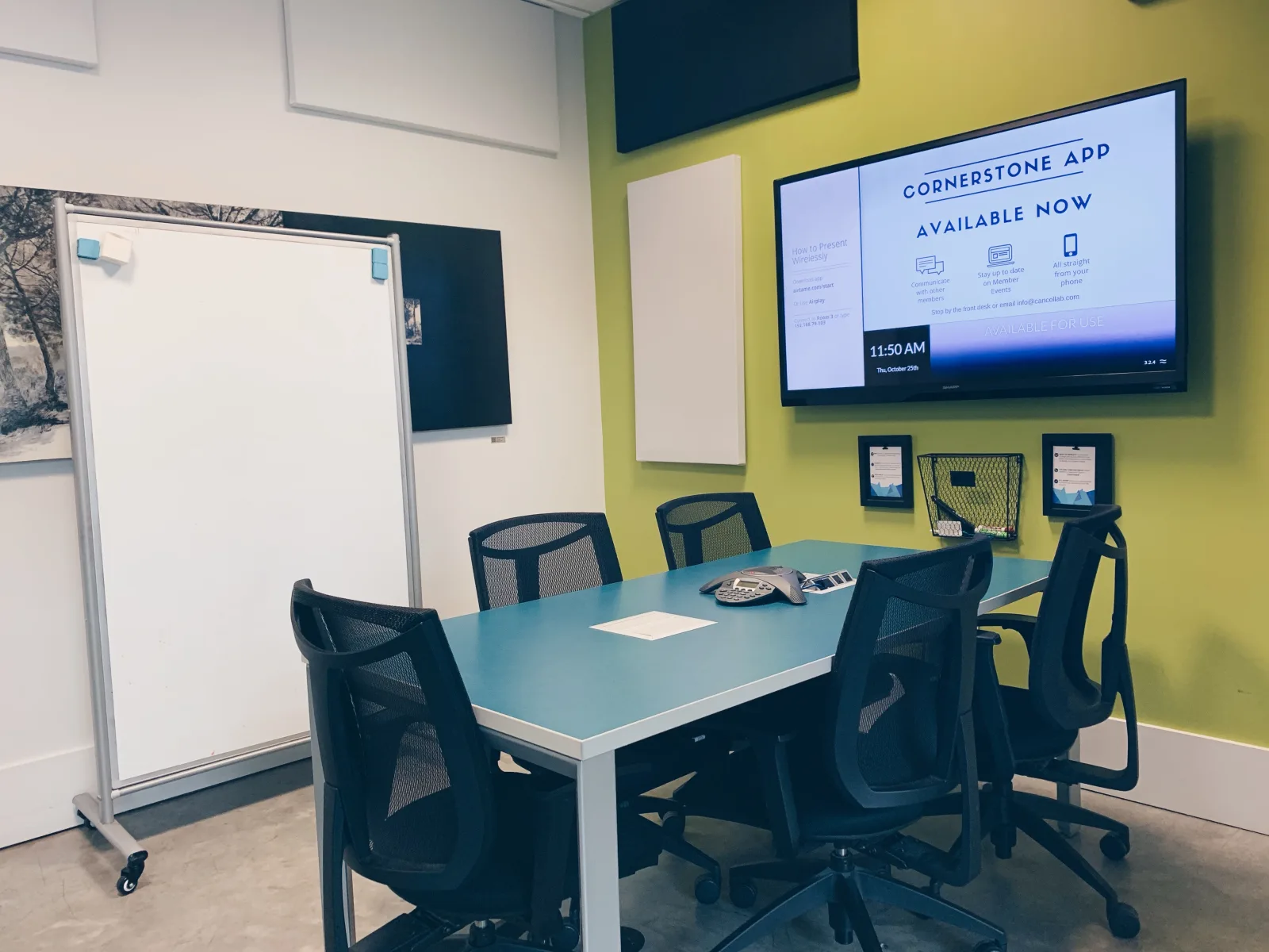 Meeting room with green accent wall
